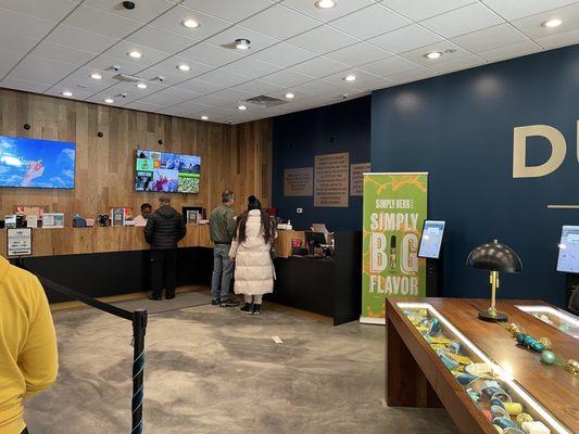 Waiting in the adult use line to checkout.