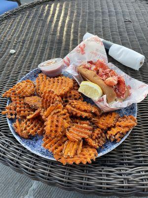The lobster roll! It's $28, comes with side of fries/onion rings.