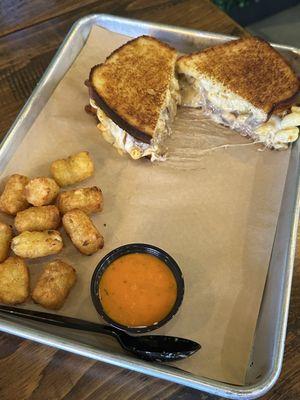 Short rib grilled cheese with mac& cheese added. Comes with tots and tomato soup.
