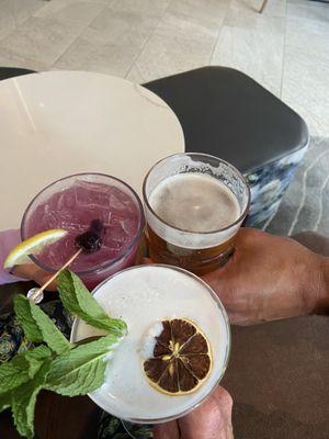 Gin drink, beer and a blackberry lemonade