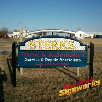 Carved dimensional sign with a 6 foot wrench for Sterks Diesel in Pella, Iowa