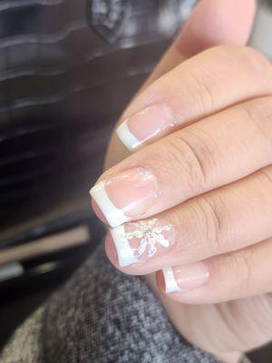 I requested a minimalist yet festive French tip nails. I added pearl chrome to the white tip.