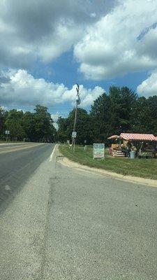 They sell fresh corn, melons, tomatoes, cherries, peaches, green beans, and more