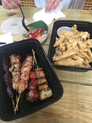 The best dishes here - skewers and fried mushrooms. You can ignore the raw octopus in this photo because it tastes awful.