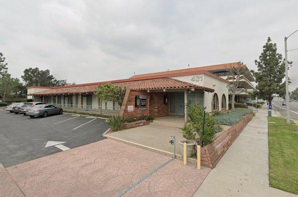 First building on the right as soon as you enter El Rancho Plaza. Suite #100