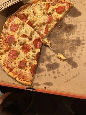 Half eaten pizza