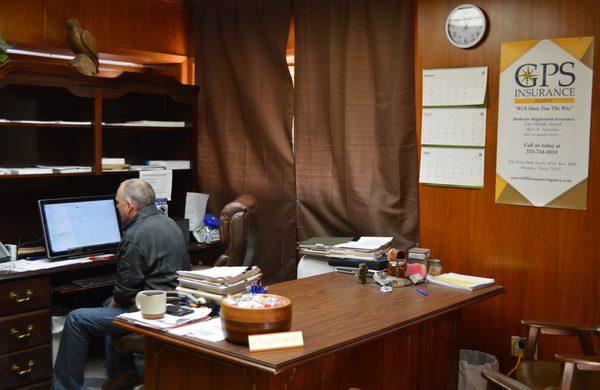 Craig G at work looking for the best Medicare policy for a client.