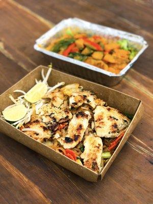 Front: Lemongrass Chicken Over Pad Thai Back: Crispy Salmon Pumpkin Curry