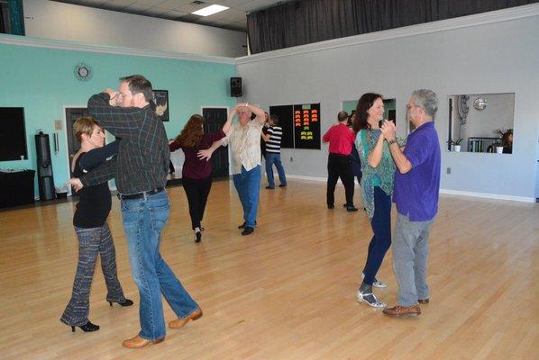 Teaching a group social dance lesson