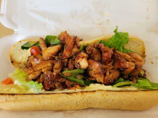 Bourbon chicken sub sandwich. Mine is without cheese and banana peppers.
