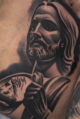 San Judas tattoo.