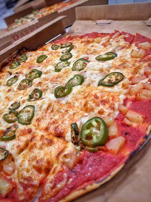 Jalapeno, pineapple and pepperoni pizza