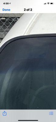 Parking sticker visible