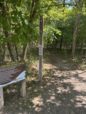 Entrance signage with rules and regulations