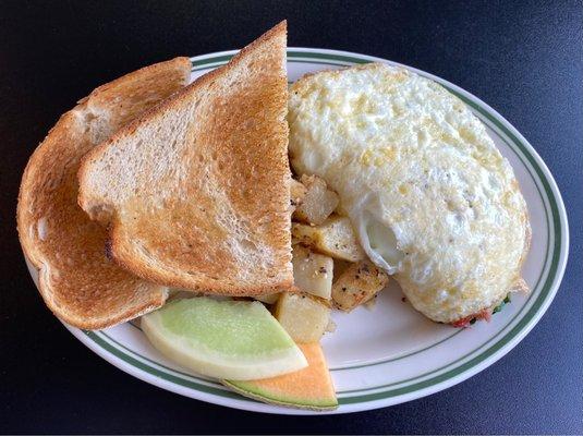 Egg whites with spinach, homies and sour dough bread