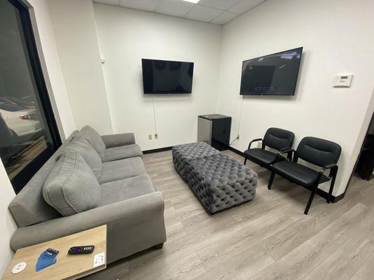 2 televisions and super comfy sofa!