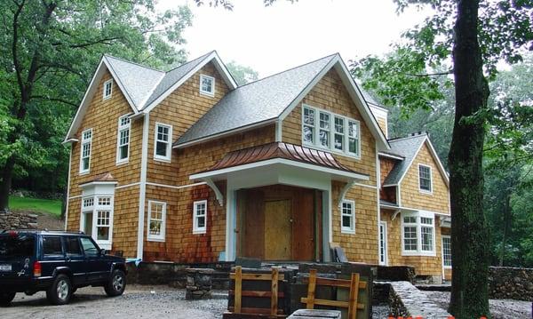 Victorian style pool house with full kitchen, full bath and storage.