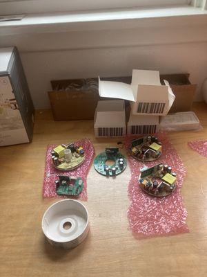 The round green on was the original. The round plastic housing is what all the wires and circuit board go into.