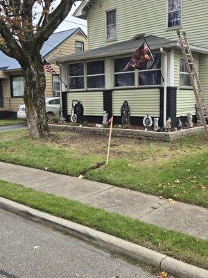 Stake, inches away from drainage pipe