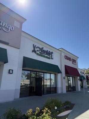 Outside with the new sign