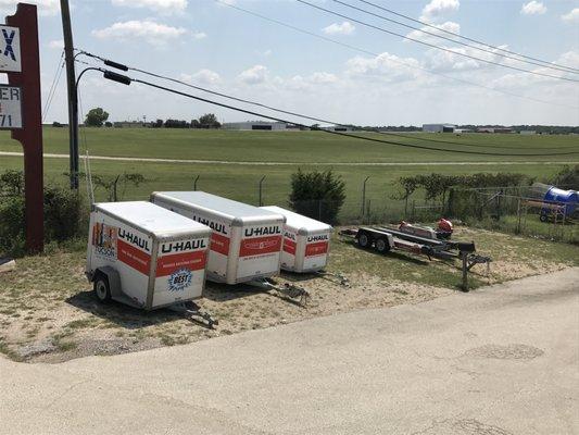A few U-Haul Trailers ready to help you move.