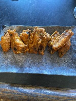 23.95 Game Day Special (large cheese pizza and 12 wings). These are the wings. We chose Buffalo sauce