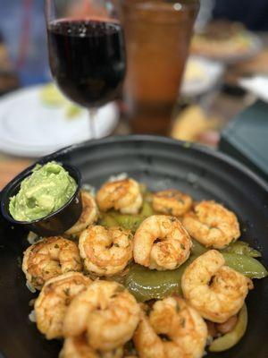 Build your own Bowl- shrimp, peppers, onions, guacamole, pinto beans, and cilantro rice