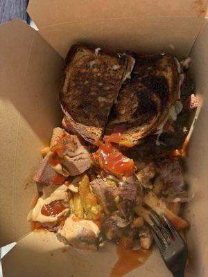 Beef brisket Reuben with loaded fries Yum
