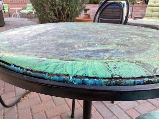 Flawed outdoor table made by Terri Malloy at The Coop in Sonoita, AZ