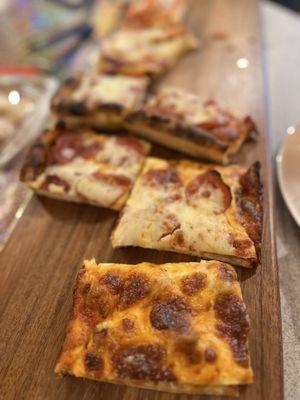 Sausage Bakery Style Pizza; Pepperoni Bakery Style Pizza (each slice is 1/4 of an order)