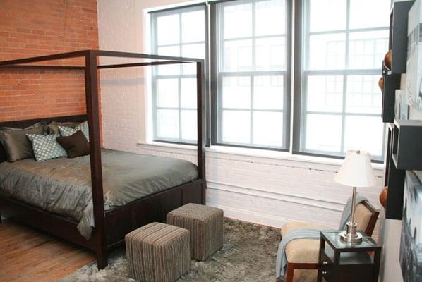 Exposed brick in some units, beautiful wood floors throughout, spacious hallways for move in!