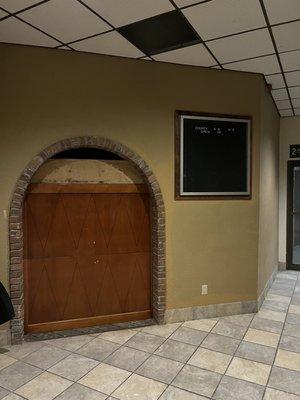 Boarded up restaurant.