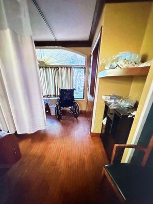 Dads room dark wood everywhere no light