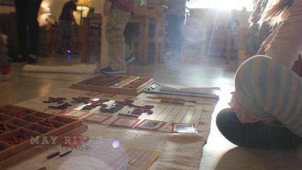 Learning how to form words.