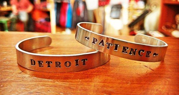 Handstamped alunimum cuff bracelets. Available in childrens to men's sizes, with several font styles to choose from. Custom orders welcomed!