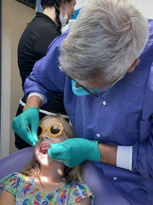 Dr. Jerry finding "wiggly" teeth!