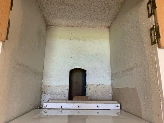 She completely skipped area above the dryer. This is after the painting job was done