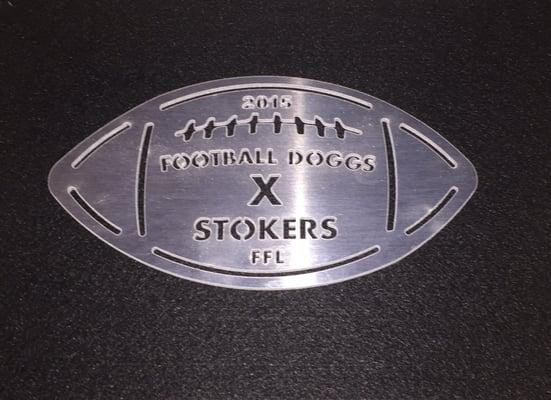 Football shaped aluminum gift done by Waterjet. Looks even better in person.
