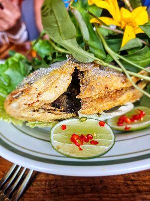 Crispy Whole Fish- whole dorado, tuk m'pil, tuk trey koh kong, lettuce wraps, herb adventure. $48. Tasty. A bit hard to eat