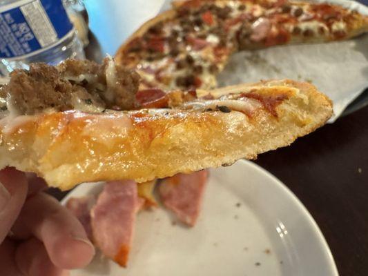 Crust too thick and under cooked