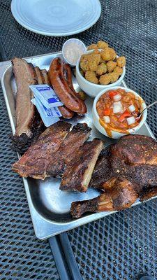 Brisket, sausage, ribs,  1/2 chicken, baked beans, okra