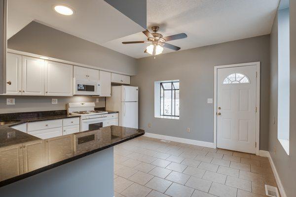 Fresh paint, cabinets and granite counter tops to give this old 1890s home a fresh and updated look