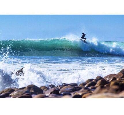 Surf lessons are all about having fun and developing style. Nick Hastings demonstrating exactly that on this clean right hand beauty.