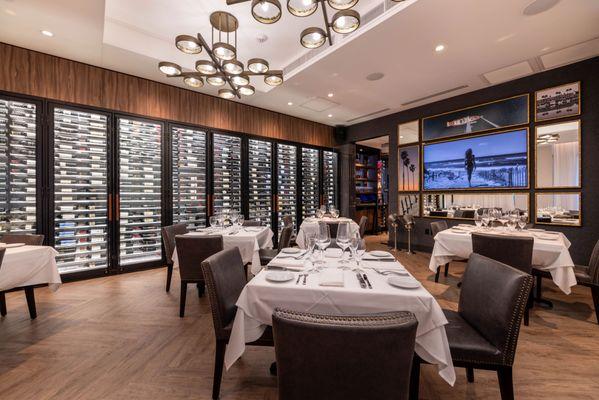 Custom luxury restaurant wine wall for a private dining room at Ocean 48 in Newport Beach, CA at Fashion Island.