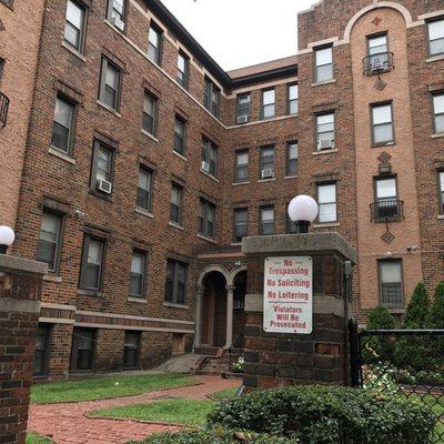 Broken windows screen, not matching blinders, blankets to cover windows, run down building