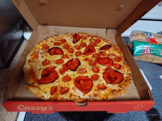 I just picked up my pepperoni, pepperoni,  pepperoni pizza. At least 1/3 of the pictured pepperoni from the ad are missing.