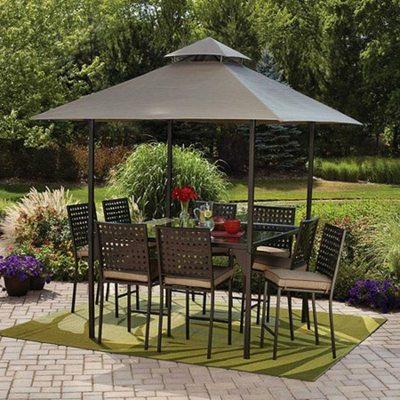 Gazebo cover with patio furniture.