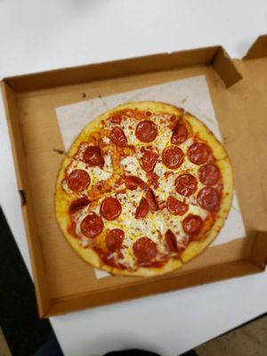 Cauliflower pepperoni pizza