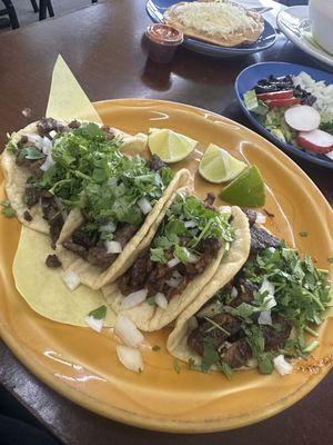 Carne asada and al pastor tacos