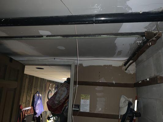 Wire to garage door opener left hanging. Sloppy work.